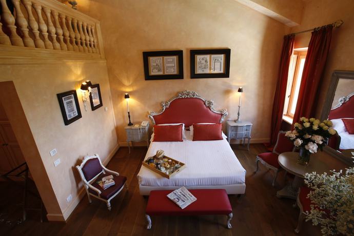 Imagen de la habitación del Hotel L'andana. Foto 3