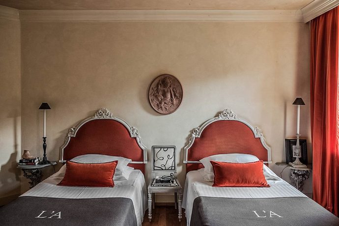 Imagen de la habitación del Hotel L'andana. Foto 19