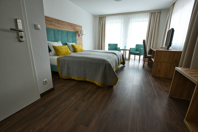 Imagen de la habitación del Hotel Landgasthof Altes Kurhaus. Foto 19