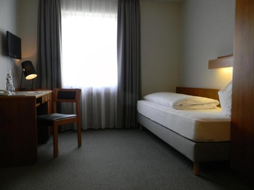 Imagen de la habitación del Hotel Landgut Burg Gmbh. Foto 9