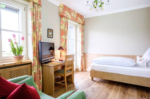 Imagen de la habitación del Hotel Landhaus Am Stein Tegernsee. Foto 10