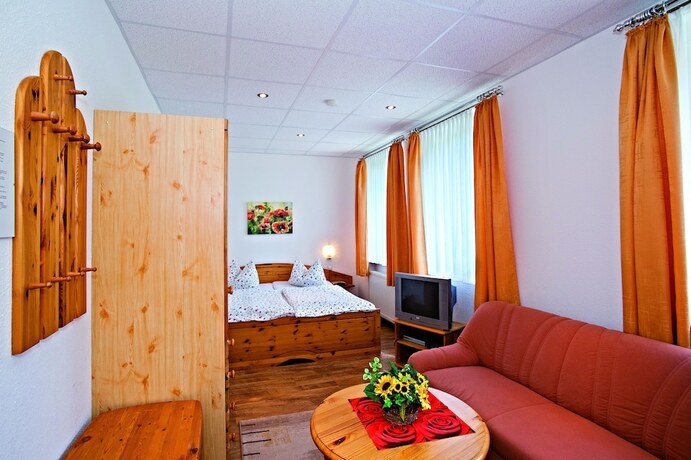 Imagen de la habitación del Hotel Landhaus Bergidyll. Foto 19