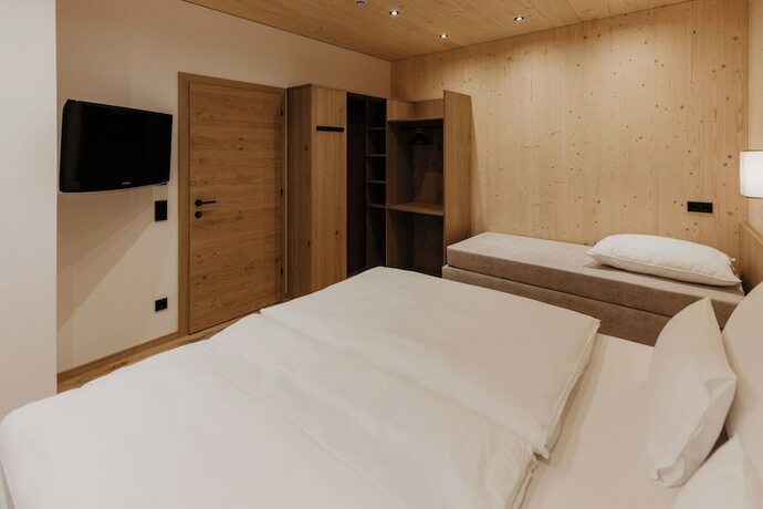 Imagen de la habitación del Hotel Landhaus Saalbach. Foto 14