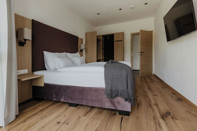Imagen de la habitación del Hotel Landhaus Saalbach. Foto 16