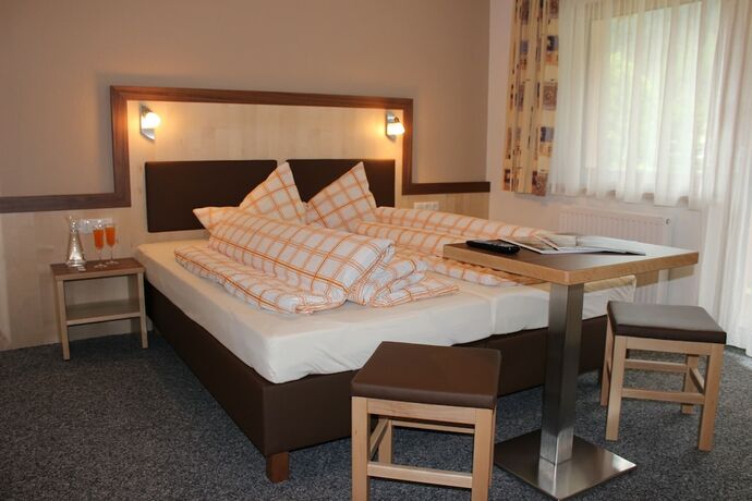 Imagen de la habitación del Hotel Landhaus Sch&ouml;pf and Haus Alpina. Foto 15