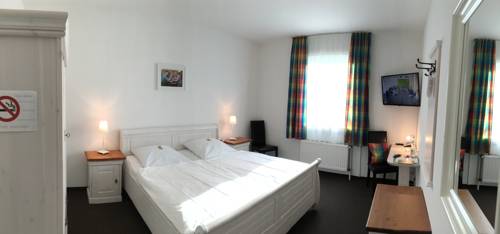 Imagen de la habitación del Hotel Landhaus Wesermarsch. Foto 13