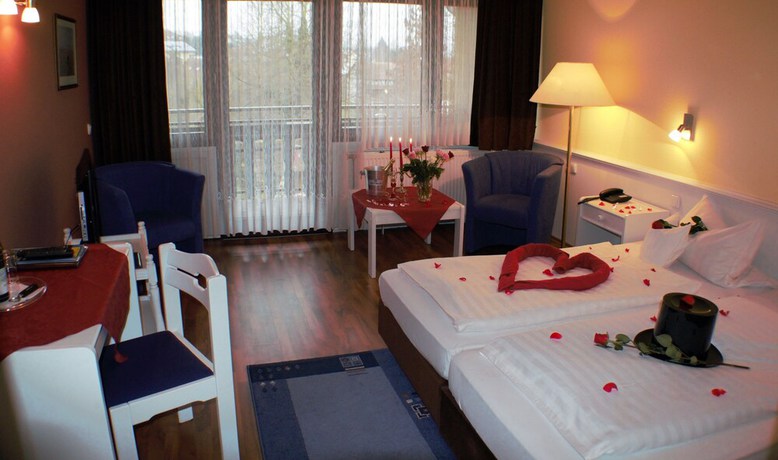 Imagen de la habitación del Hotel Landhotel Combecher. Foto 7