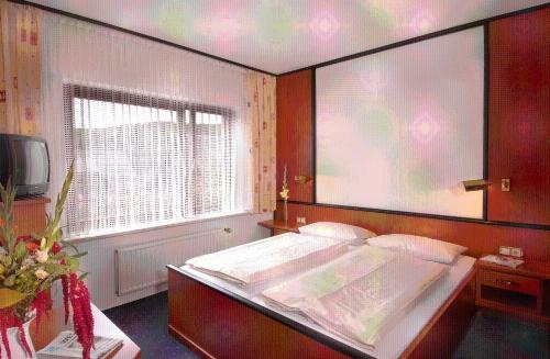 Imagen de la habitación del Hotel Landhotel M&uuml;ller. Foto 10