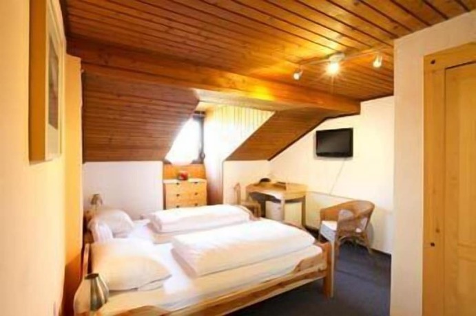 Imagen de la habitación del Hotel Landhotel Sch&ouml;ll. Foto 17