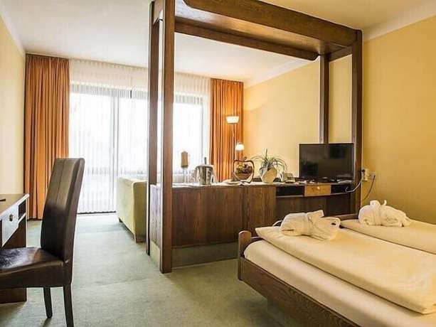 Imagen de la habitación del Hotel Landhotel Vierjahreszeiten. Foto 19