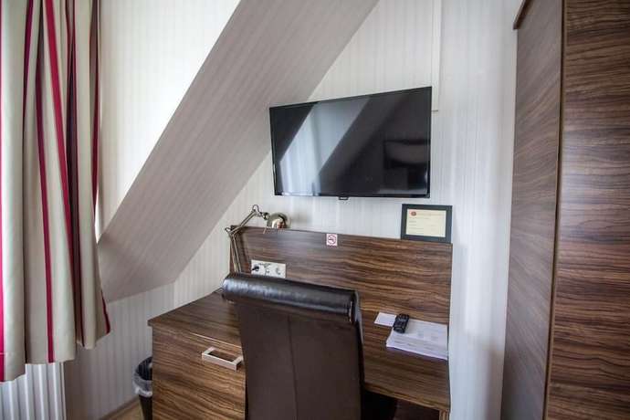 Imagen de la habitación del Hotel Landhotel Wolfschlugen. Foto 9