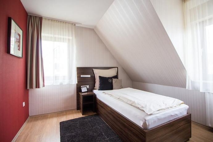 Imagen de la habitación del Hotel Landhotel Wolfschlugen. Foto 10