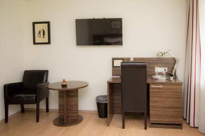 Imagen de la habitación del Hotel Landhotel Wolfschlugen. Foto 13