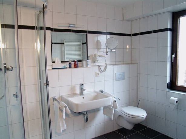 Imagen de la habitación del Hotel Landhotel Wolfschlugen. Foto 15