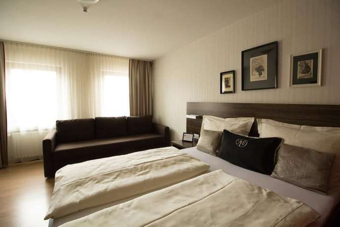 Imagen de la habitación del Hotel Landhotel Wolfschlugen. Foto 16