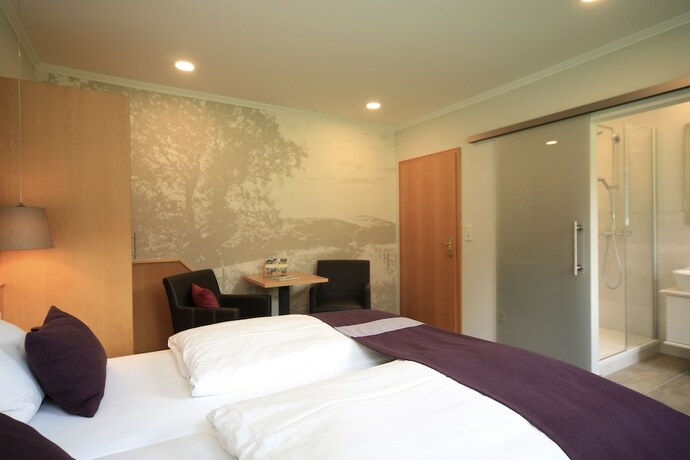 Imagen de la habitación del Hotel Landidyll Landaus Liesetal. Foto 15