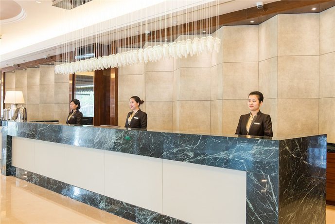 Imagen de los interiores del Hotel Landison Plaza Ningbo. Foto 10