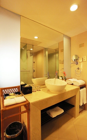 Imagen de la habitación del Hotel Landmark International. Foto 6