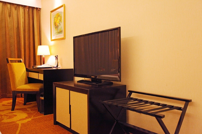 Imagen de la habitación del Hotel Landmark International. Foto 8