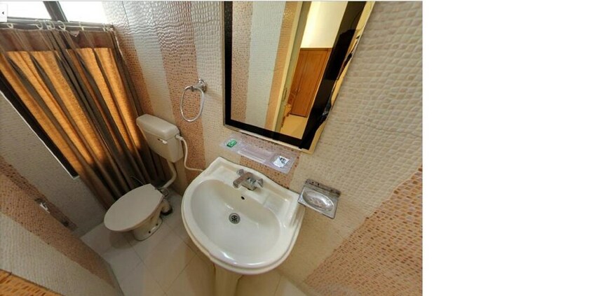 Imagen de la habitación del Hotel Landmark-haridwar. Foto 24