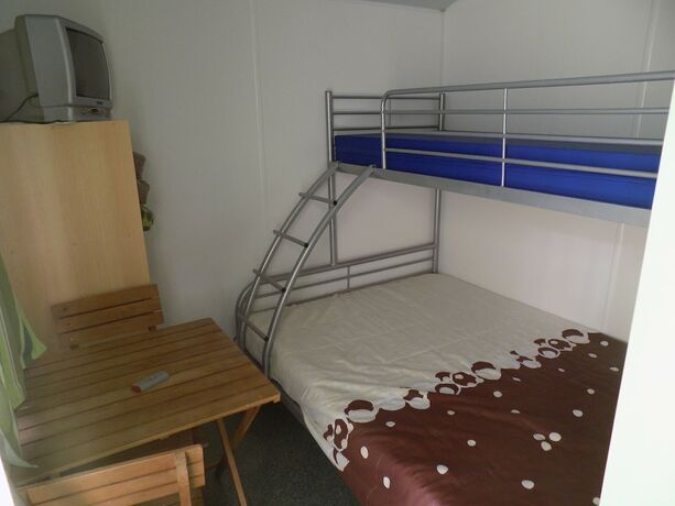 Imagen de la habitación del Hotel Land's Hause Bungalows. Foto 15