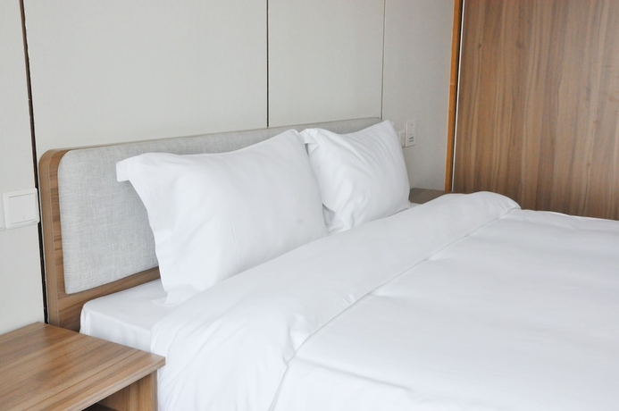 Imagen de la habitación del Hotel Landsea Apartments Shanghai Elite Space. Foto 4