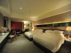 Imagen de la habitación del Hotel Landyatt Park Chongqing. Foto 3