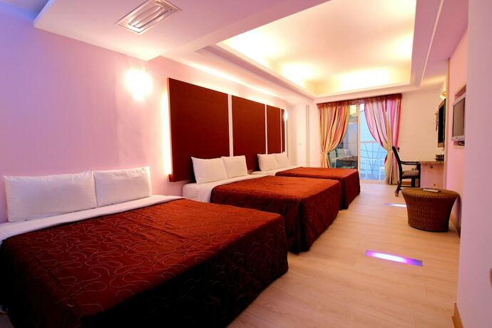 Imagen de la habitación del Hotel Lang Qin Hai Inn. Foto 15