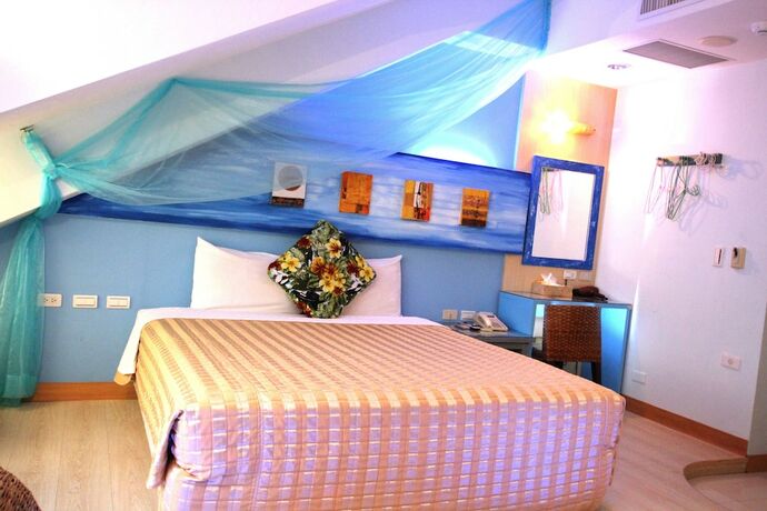 Imagen de la habitación del Hotel Lang Qin Hai Inn. Foto 16