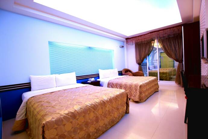 Imagen de la habitación del Hotel Lang Qin Hai Inn. Foto 20