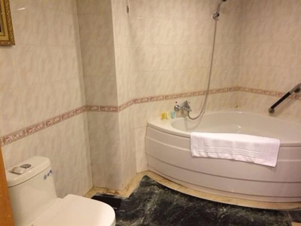 Imagen de la habitación del Hotel Langfang International. Foto 11