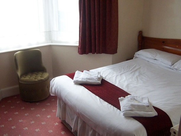 Imagen de la habitación del Hotel Langham Court. Foto 8