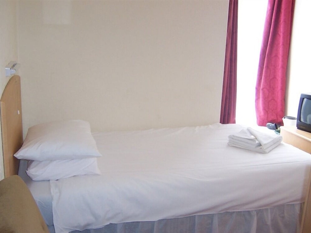 Imagen de la habitación del Hotel Langham Court. Foto 11