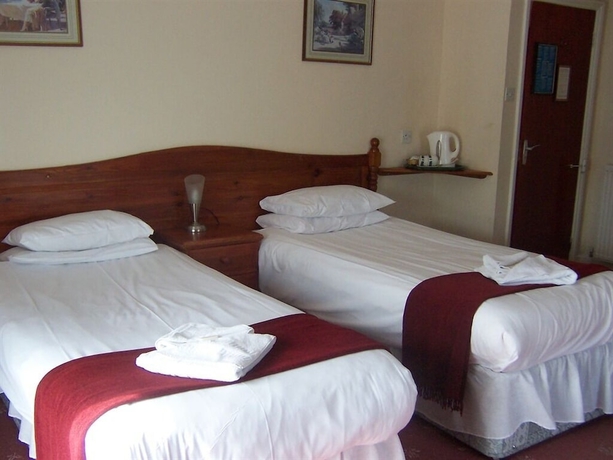 Imagen de la habitación del Hotel Langham Court. Foto 12
