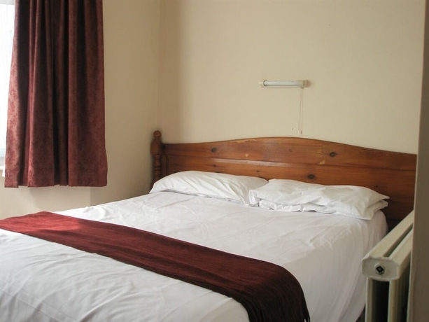 Imagen de la habitación del Hotel Langham Court. Foto 13