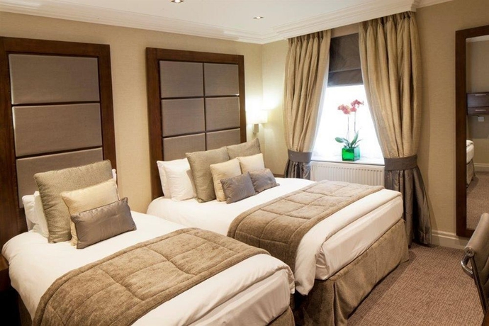 Imagen de la habitación del Hotel Langham Court. Foto 5