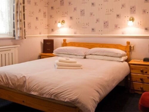 Imagen de la habitación del Hotel Langham. Foto 5