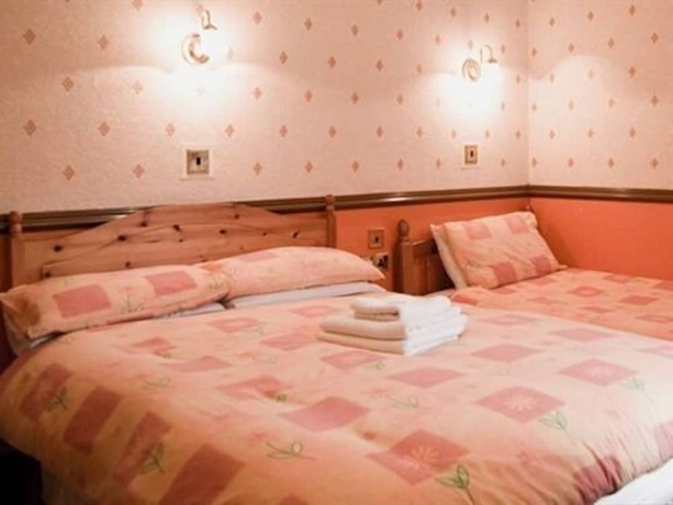 Imagen de la habitación del Hotel Langham. Foto 8