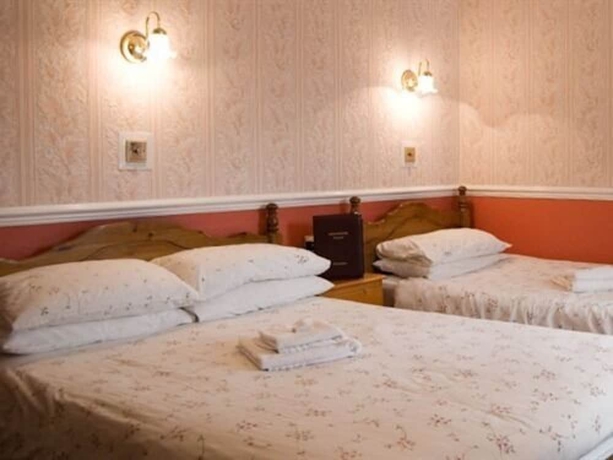 Imagen de la habitación del Hotel Langham. Foto 9