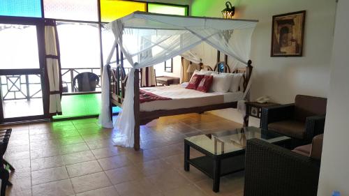 Imagen de la habitación del Hotel Langi Langi Beach Bungalows. Foto 11