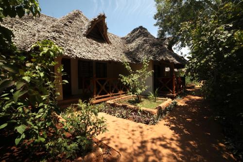 Imagen de la habitación del Hotel Langi Langi Beach Bungalows. Foto 12