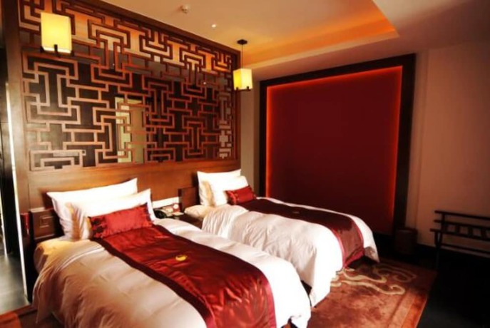 Imagen de la habitación del Hotel Langzhong Hirizon Hotel. Foto 8