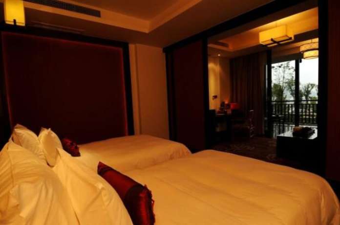 Imagen de la habitación del Hotel Langzhong Hirizon Hotel. Foto 11