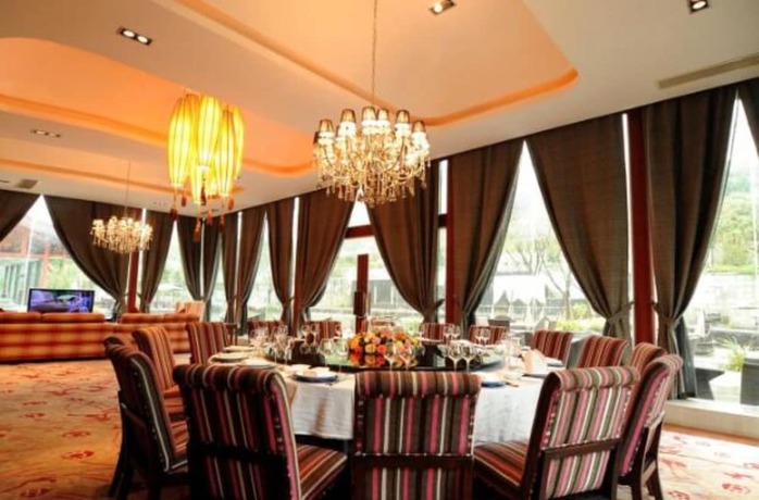 Imagen del bar/restaurante del Hotel Langzhong Hirizon Hotel. Foto 3