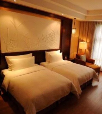 Imagen de la habitación del Hotel Langzhong Hirizon Hotel. Foto 19