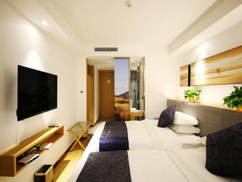 Imagen de la habitación del Hotel Lanmei Boutique Hotel Xiyuan West Station Branch Lanzhou. Foto 8