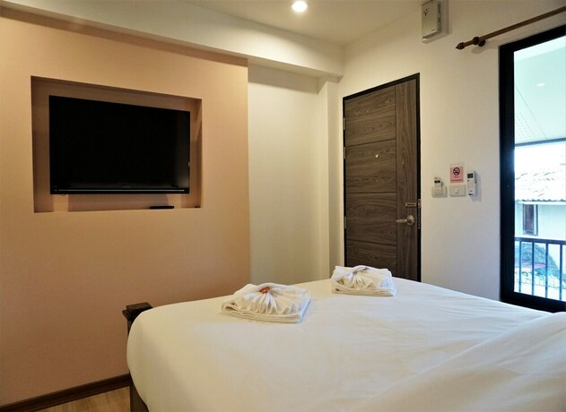 Imagen de la habitación del Hotel Lanna Haven. Foto 8
