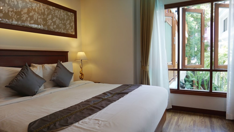 Imagen de la habitación del Hotel Lanna Tree Boutique Hotel. Foto 16