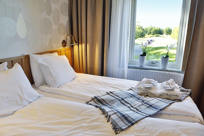 Imagen de la habitación del Hotel Lannalodge. Foto 9