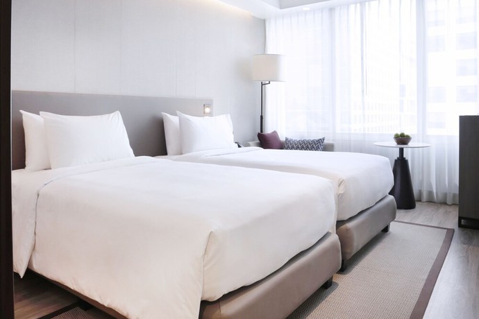 Imagen de la habitación del Hotel Lanson Place Mall Of Asia Manila. Foto 4